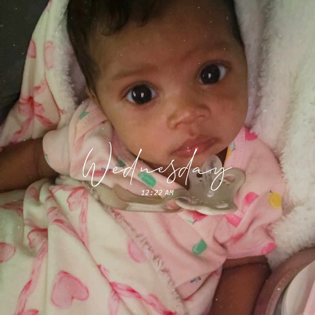 Hera joined the competition — help win amazing prizes! baby, blanket, pacifier, infant, cozy, pink, heart_pattern, clothing, wrapped, wide_eyes, portrait, cute, soft_texture, indoors, sleepwear, child, newborn, face, expression, resting