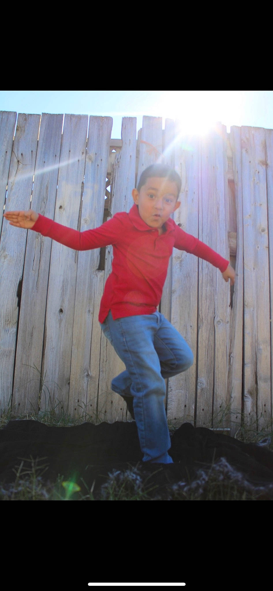 Gabriel joined the competition — help win amazing prizes! child, denim, electric_blue, flash_photography, fun, grass, happy, jeans, leisure, people_in_nature, person, shadow, sitting, sky, soil, standing, surprise, t_shirt, water, wood