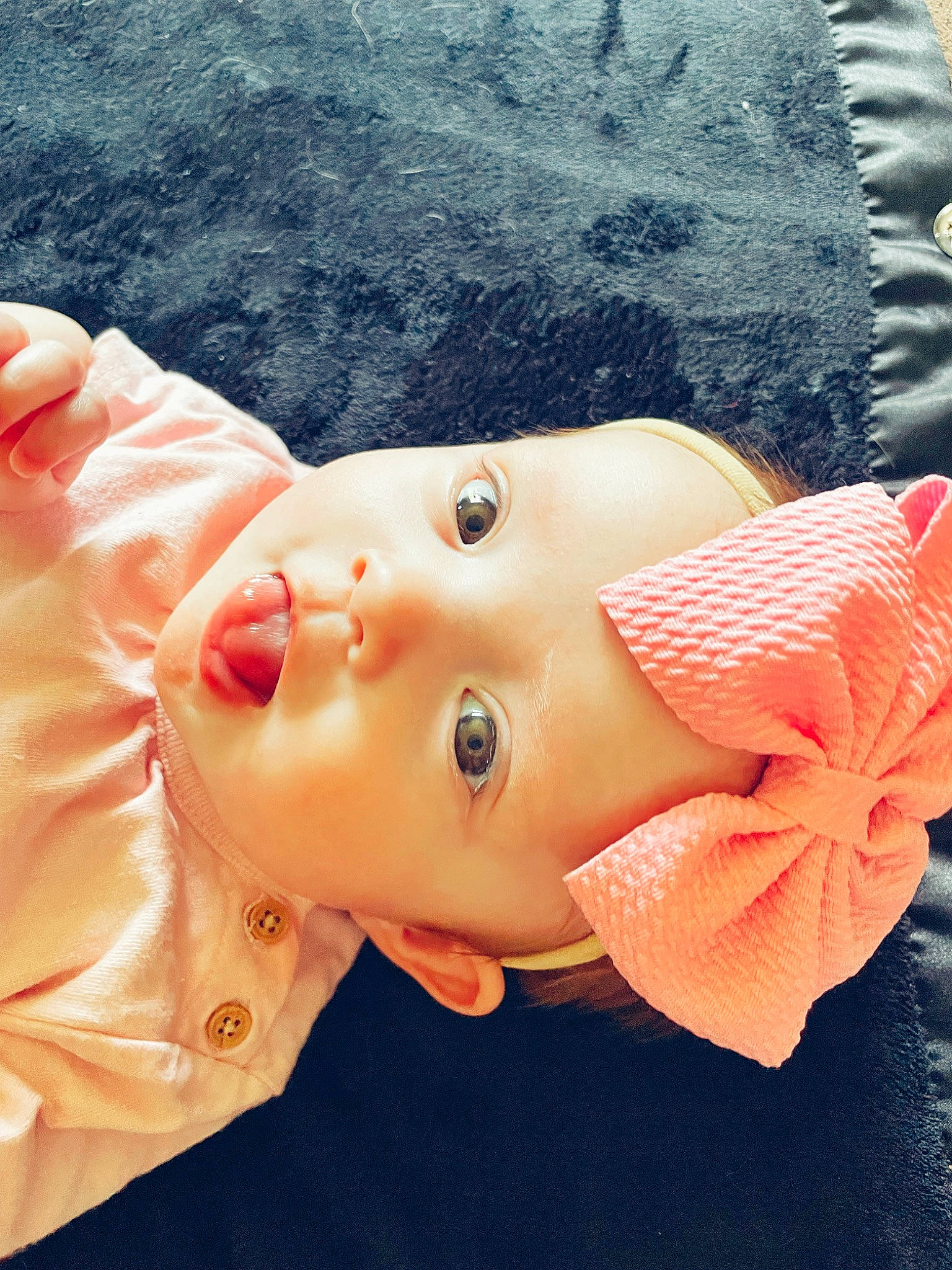 Alaia is registered to the contest to win money with this photo: baby, baby_toddler_clothing, cheek, child, chin, eye, eyelash, fashion_accessory, happy, headgear, headwear, lip, neck, nose, orange, pattern, peach, person, pink, skin