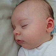 Dougie joined the competition — help win amazing prizes! baby, calm, child, closeup, cute, ear, face, head, indoors, infant, newborn, peaceful, pillow, portrait, relaxation, rest, skin, sleeping, soft, white_clothing