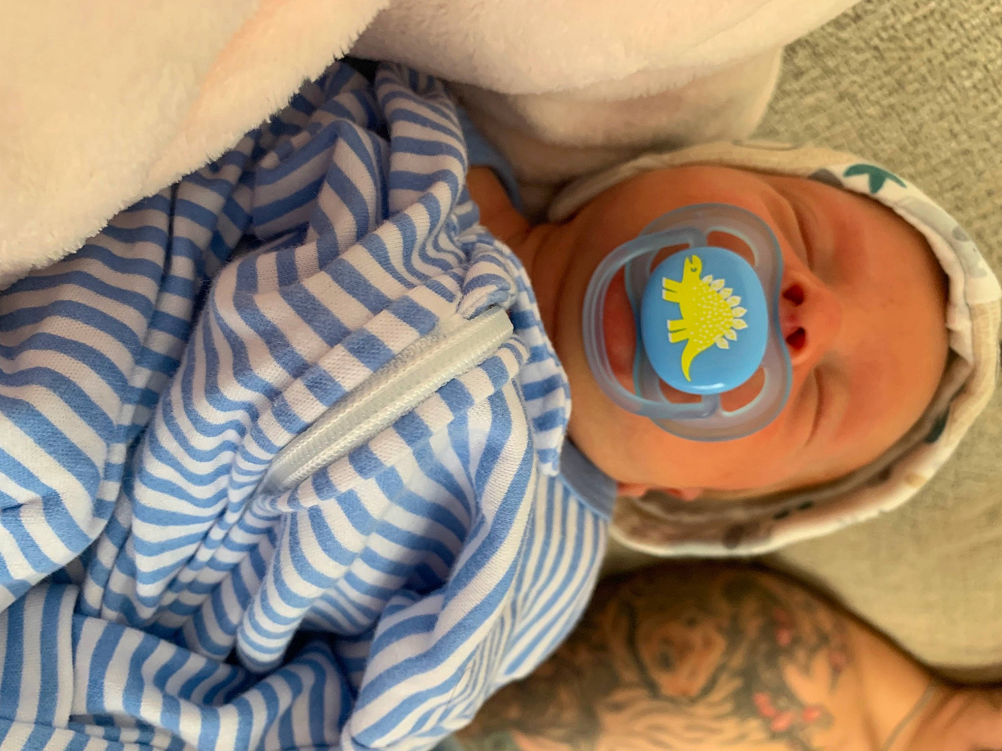 Justin joined the competition — help win amazing prizes! baby, baby_products, baby_toddler_clothing, baseball_cap, bedtime, cap, child, comfort, electric_blue, fashion_accessory, hat, headgear, linens, pattern, person, personal_protective_equipment, plastic, room, sleep, toddler