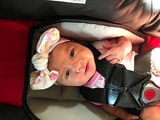 Baeleigh is registered to the contest to win money with this photo: auto_part, baby, baby_carriage, car_seat, cheek, child, ear, head, headgear, headwear, mouth, neck, person, photography, product, seat_belt, toddler