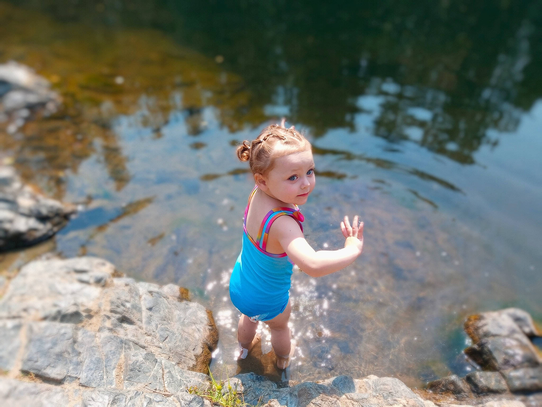 Paisley joined the competition — help win amazing prizes! baby, bathing, fun, grass, hand, happy, lake, landscape, leisure, outdoor_recreation, people_in_nature, person, puddle, recreation, rock, swimwear, toddler, tree, water, water_resources
