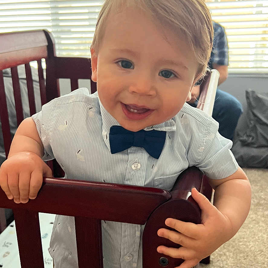Holden joined the competition — help win amazing prizes! accessories, baby, bag, bed, bodypart, couch, crib, face, finger, formalwear, furniture, hand, handbag, head, homedecor, infantbed, person, photography, portrait, tie