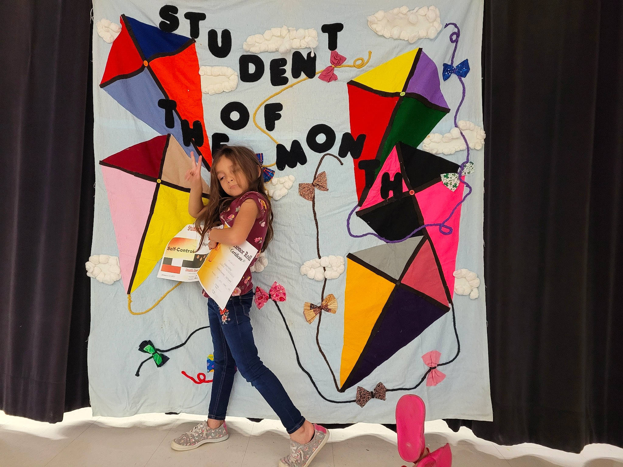 Daphne is registered to the contest to win money with this photo: advertising, animation, art, artist, carmine, curtain, entertainment, event, fashion_design, font, fun, graphic_design, graphics, linens, pattern, performing_arts, person, smile, t_shirt, triangle