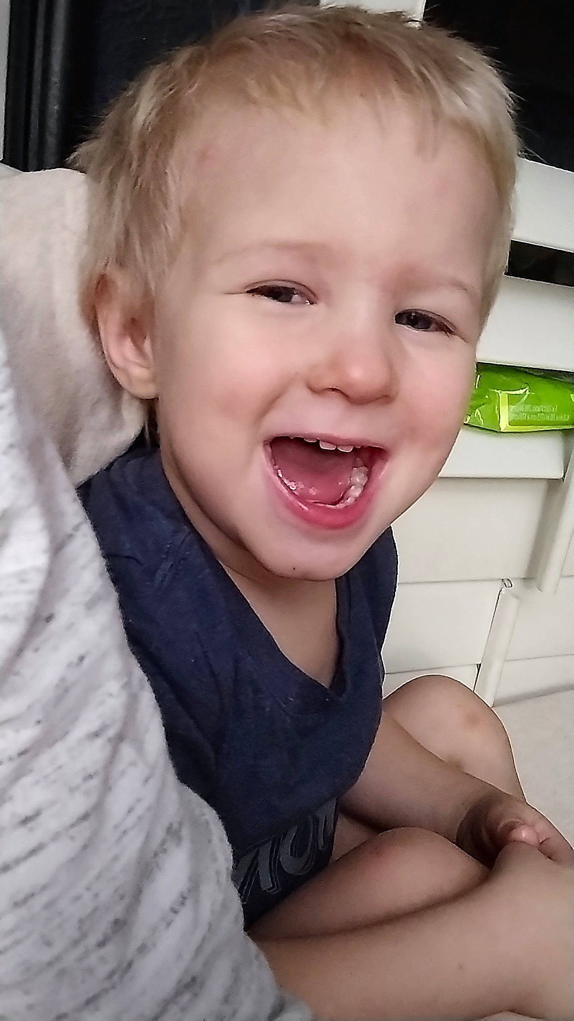 Paul is registered to the contest to win money with this photo: cheek, comfort, eyelash, finger, flash_photography, gesture, happy, iris, jaw, lip, mouth, neck, nose, person, skin, sleeve, smile, thumb, toddler, tooth