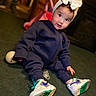 Vonah is registered to the contest to win money with this photo: bonnet, boy, child, clothing, coat, costume, face, footwear, hat, head, male, pants, person, photography, portrait, runningshoe, shoe, sitting, sneaker, wood