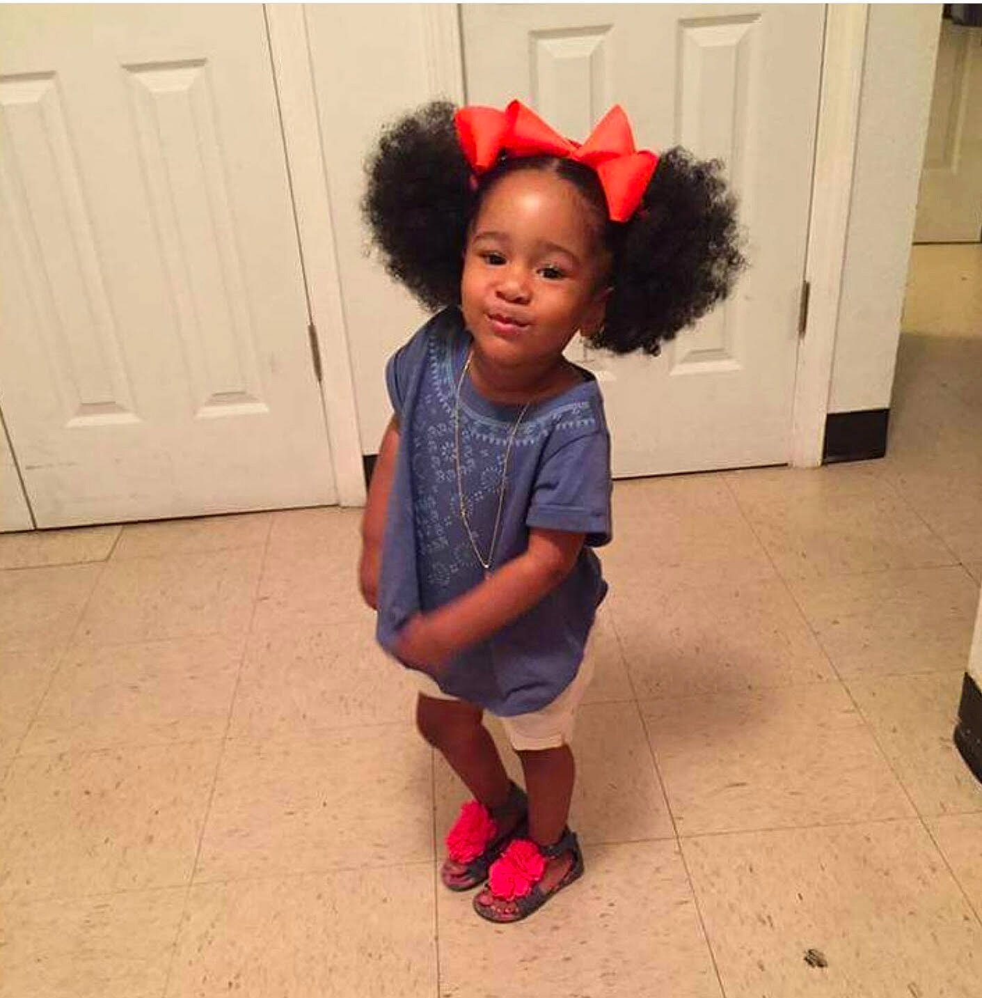 Princess Daphne is registered to the contest to win money with this photo: child, clothing, costume, day, design, fashion_accessory, flooring, fun, girl, hair, hair_accessory, headgear, outerwear, pattern, person, product, red, shoe, shoulder, standing