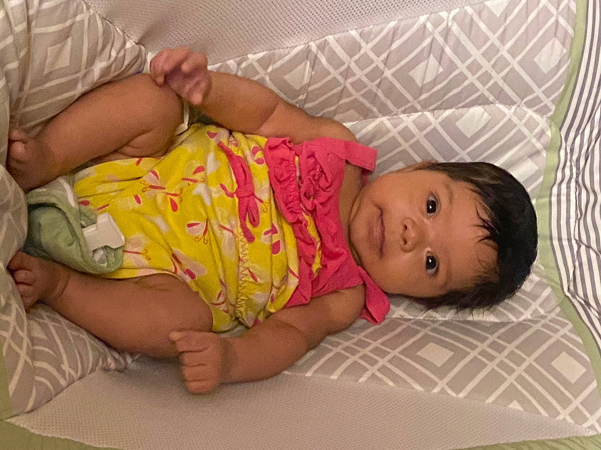 Addalynn is registered to the contest to win money with this photo: abdomen, baby, baby_toddler_clothing, cheek, child, comfort, finger, flooring, fun, human_leg, leg, nail, pattern, person, room, sitting, skin, thigh, toddler, trunk