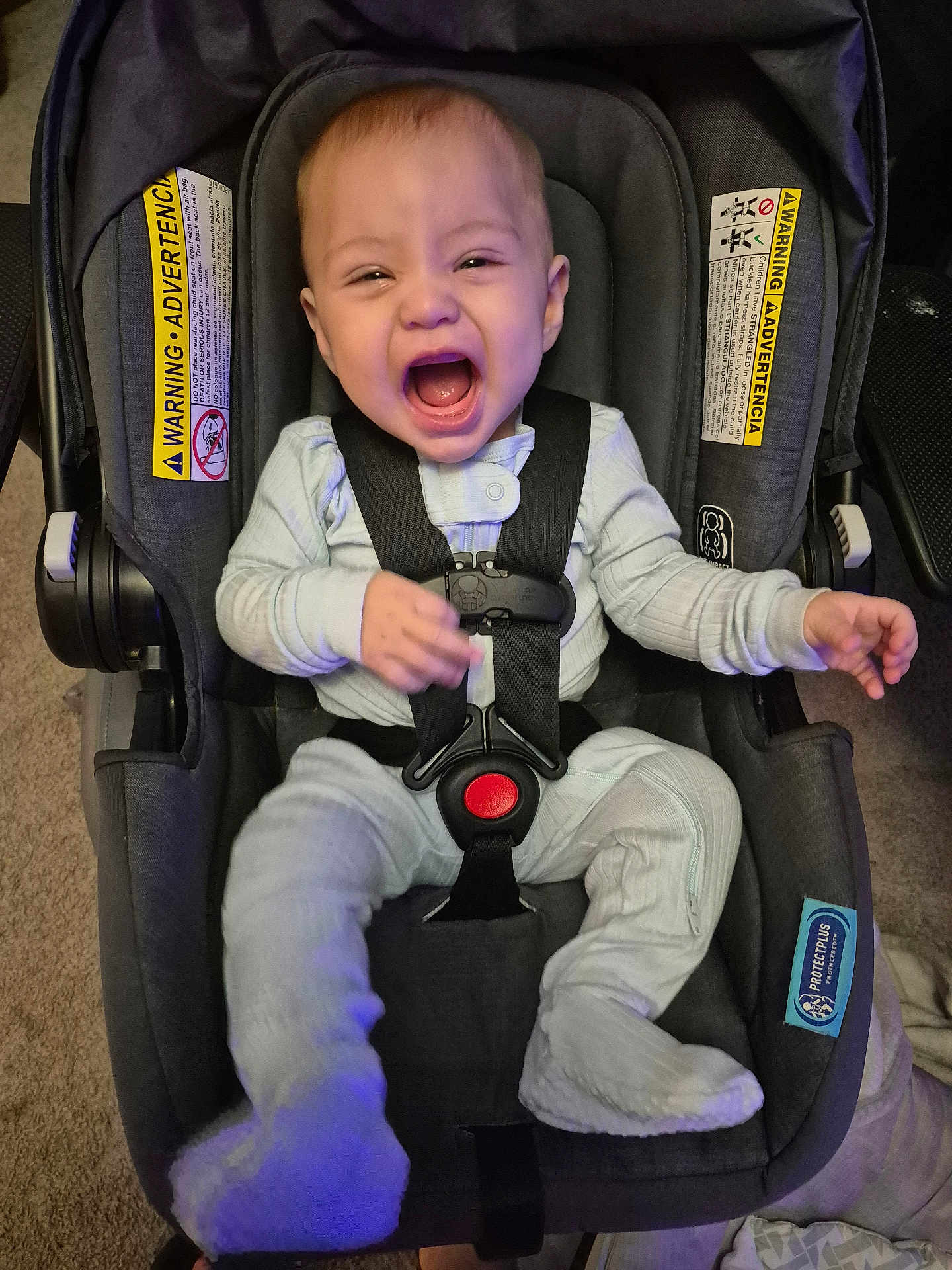 Malek is registered to the contest to win money with this photo: baby, car_seat, infant, happy, smiling, pajamas, straps, indoor, car_seat_warning, seat_belt, child, young, person, cozy, car_seat_padding, car_seat_harness, car_seat_cushion, car_seat_safety, child_safety, car_seat_infant
