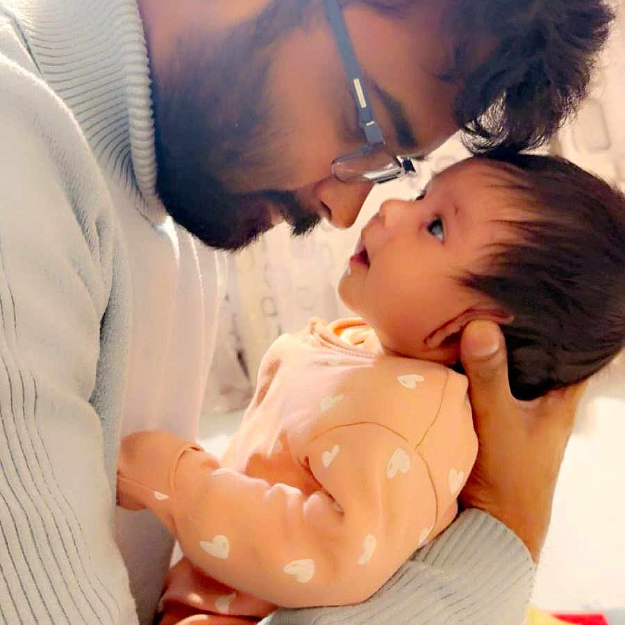 Sehrish joined the competition — help win amazing prizes! affection, baby, beard, child, closeup, cuddling, face, family, glasses, heart_pattern, holding, indoor, intimacy, love, man, parent, person, portrait, sweater, warm_light