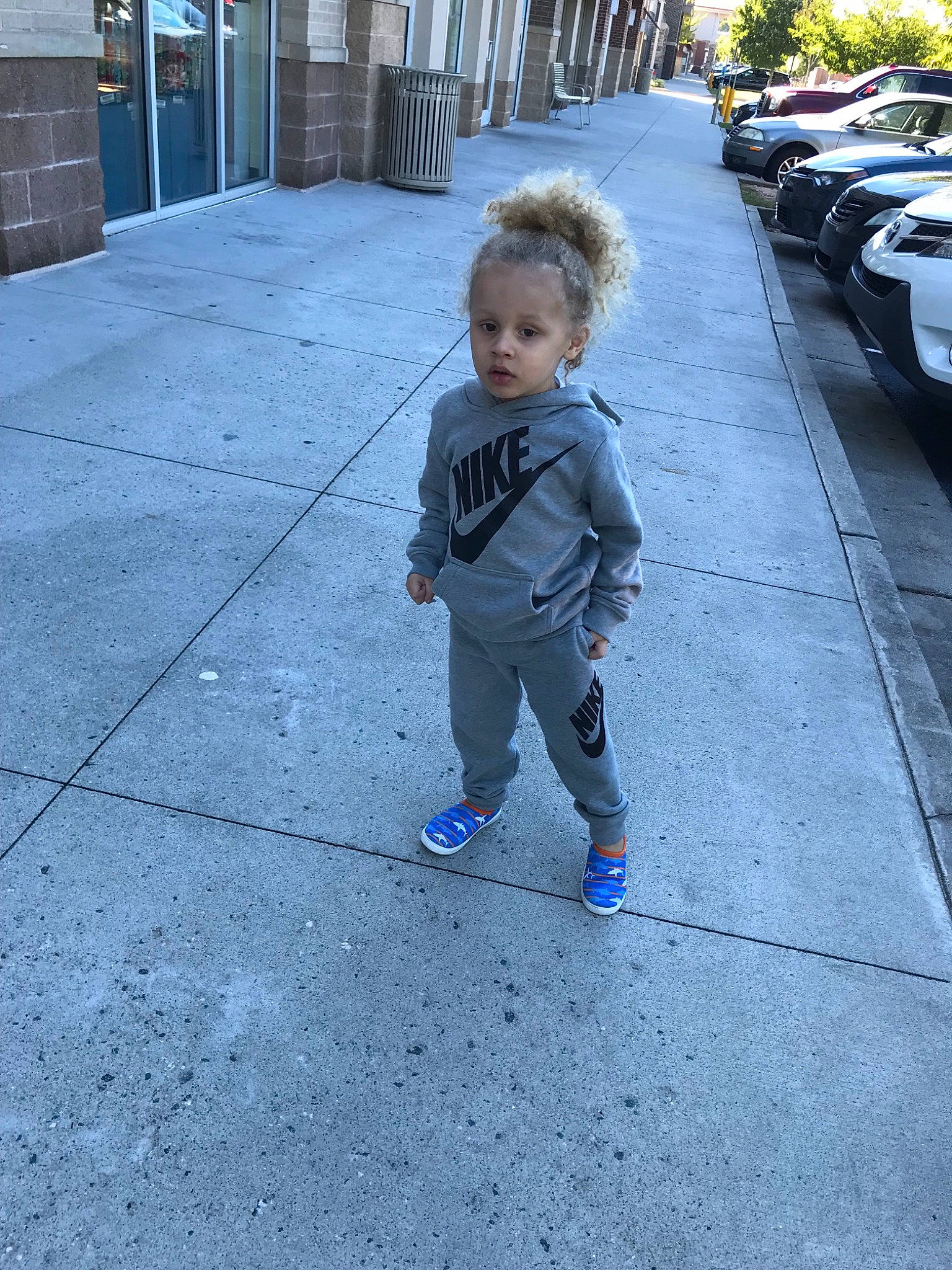 Josiah joined the competition — help win amazing prizes! asphalt, boy, child, day, footwear, fun, infrastructure, jeans, male, person, public_space, recreation, road, sidewalk, snapshot, standing, street, toddler, vacation, vehicle