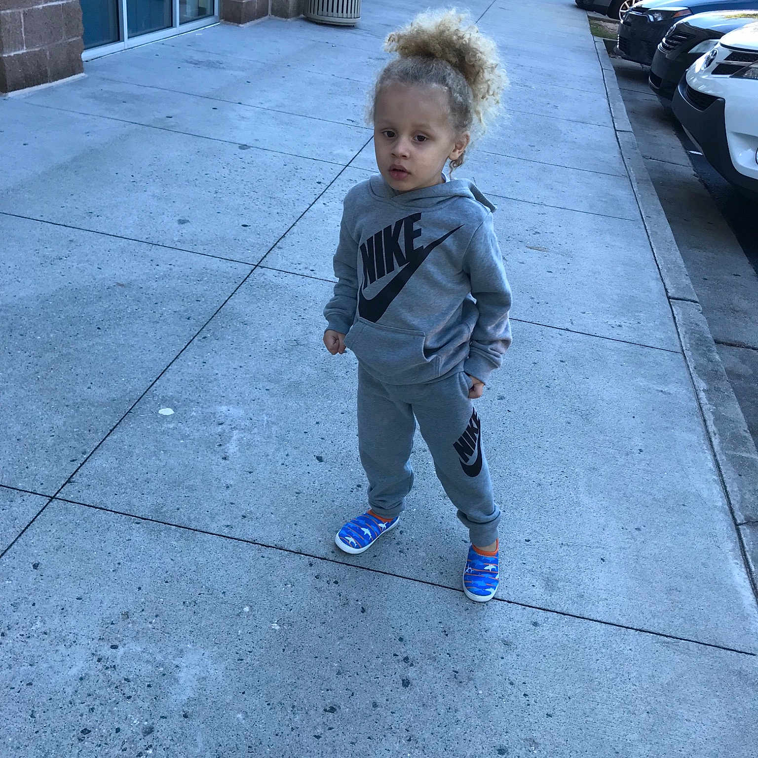 Josiah joined the competition — help win amazing prizes! asphalt, boy, child, day, footwear, fun, infrastructure, jeans, male, person, public_space, recreation, road, sidewalk, snapshot, standing, street, toddler, vacation, vehicle