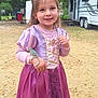 child, girl, princess_dress, purple_dress, chameleon, reptile, outdoor, gravel, camper_trailer, greenery, trees, earrings, smile, long_hair, playful, nature, daylight, boots, young, portrait
