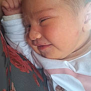 Peyton participe au concours pour gagner de l'argent avec cette photo : baby, infant, face, smile, clothing, unicorn, pattern, fabric, closeup, head, skin, person, cute, newborn, expression, soft, comfort, snuggle, child, portrait