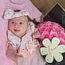 Peyton a rejoint le concours — aidez-le/la à gagner de superbes lots ! baby, infant, pink_dress, headband, flower, bouquet, roses, blanket, smiling, cute, celebration, milestone, wooden_sign, indoor, portrait, newborn, soft_texture, happy, young_child, person