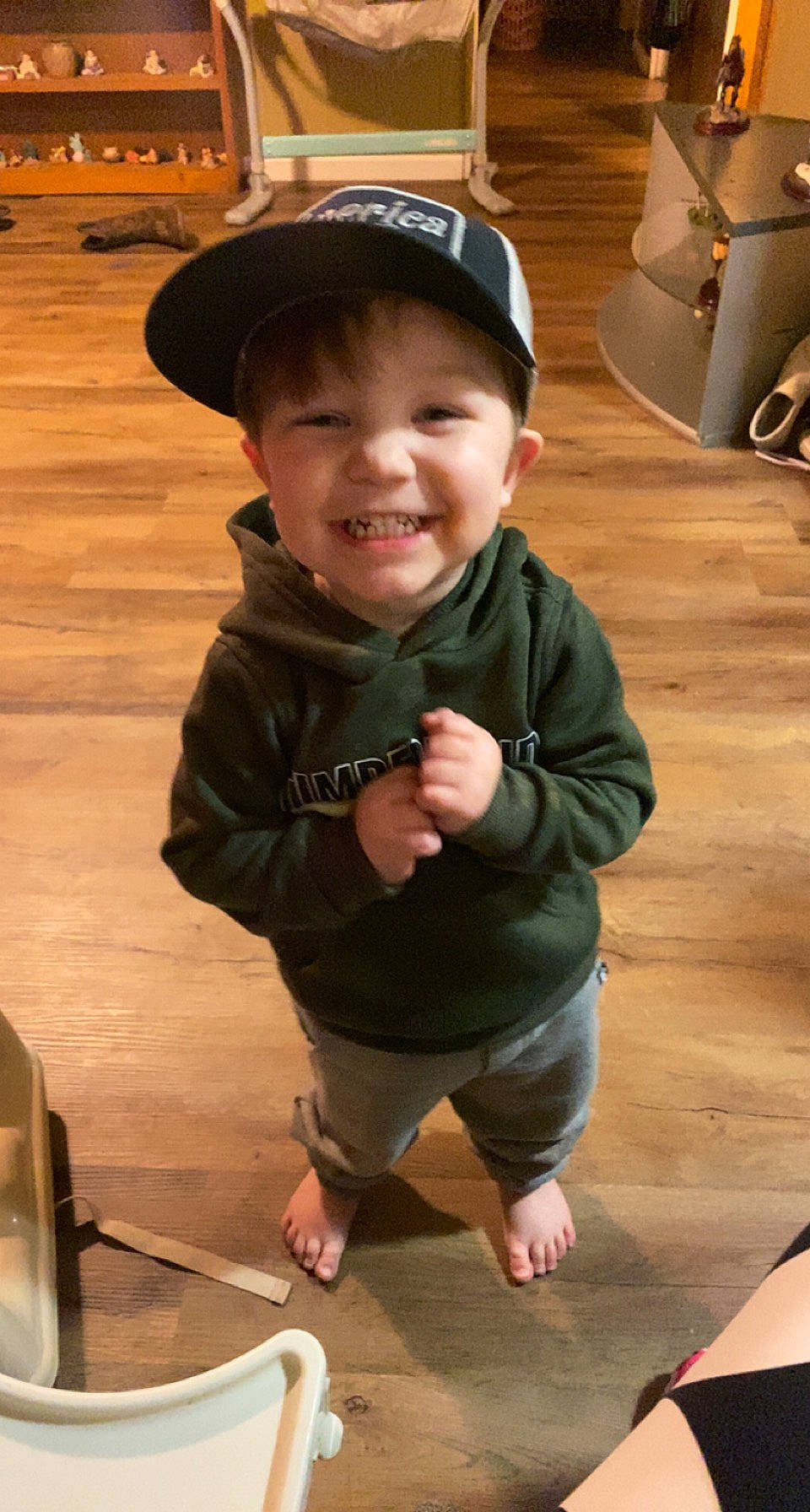 Aryan is registered to the contest to win money with this photo: baby_toddler_clothing, baseball_cap, cap, child, flash_photography, flooring, fun, happy, hat, headwear, joy, person, sitting, skin, sleeve, smile, snapshot, standing, thumb, toddler