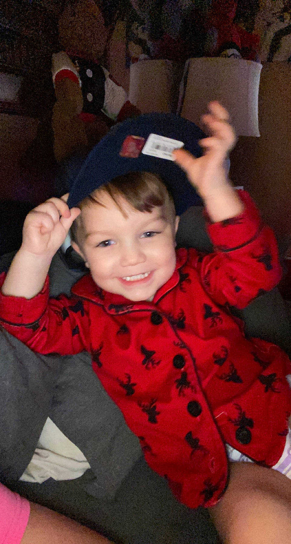 Aryan is registered to the contest to win money with this photo: baby, baby_toddler_clothing, black_hair, cheek, child, chin, eye, finger, flooring, fun, gesture, hand, happy, joy, mouth, person, sitting, skin, sleeve, smile