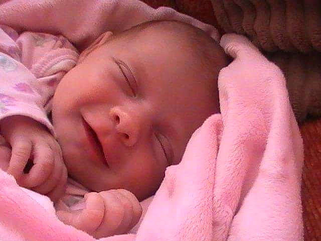 Amelia-grace is registered to the contest to win money with this photo: bedtime, cheek, child, childbirth, close_up, ear, finger, hand, infant, lip, mouth, nail, nap, nose, person, skin, sleep