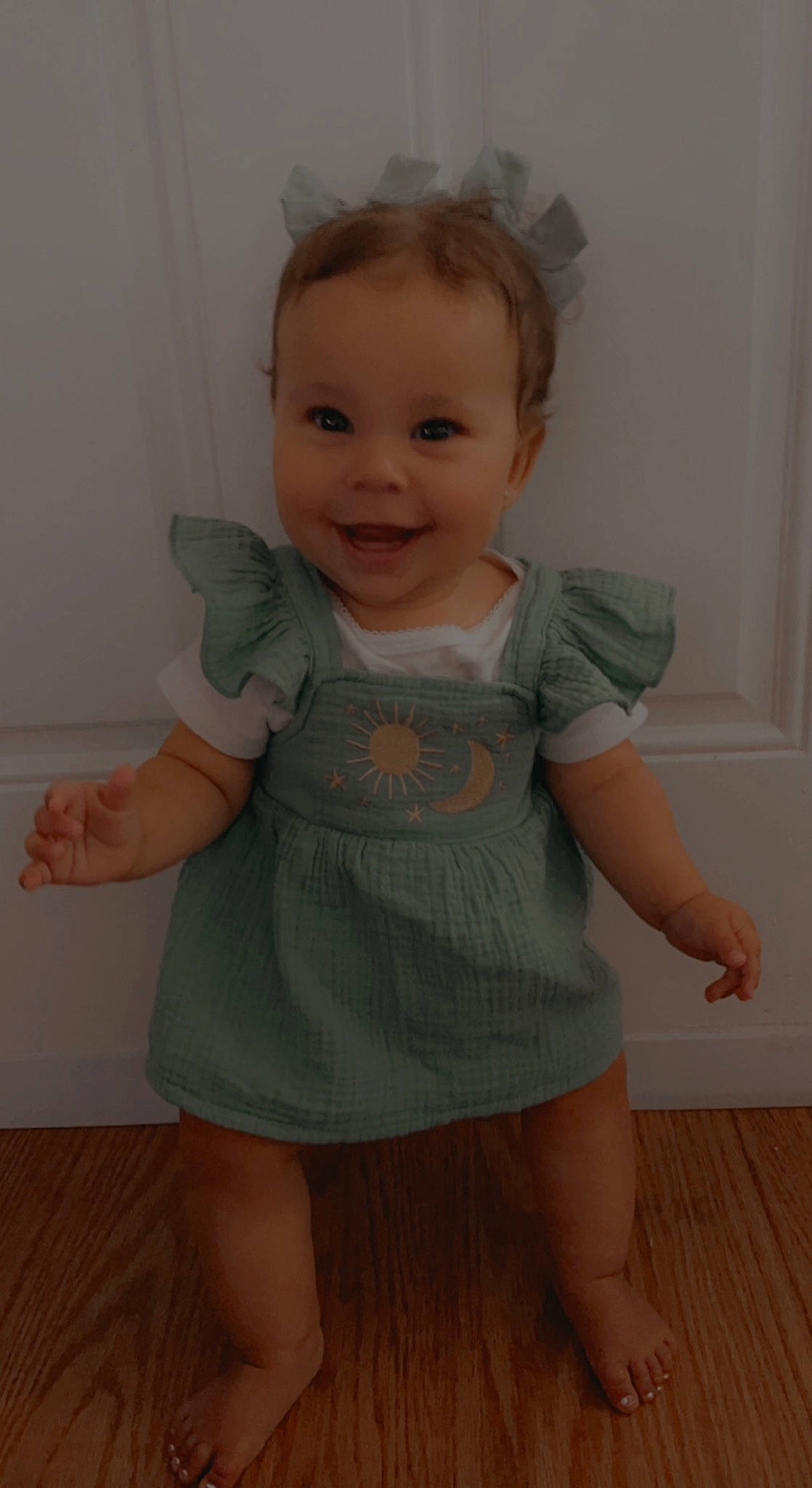 Charlotte joined the competition — help win amazing prizes! baby, baby_toddler_clothing, cheek, day_dress, eye, face, flooring, hair, human_leg, iris, joint, joy, knee, leg, one_piece_garment, person, skin, sleeve, smile, standing