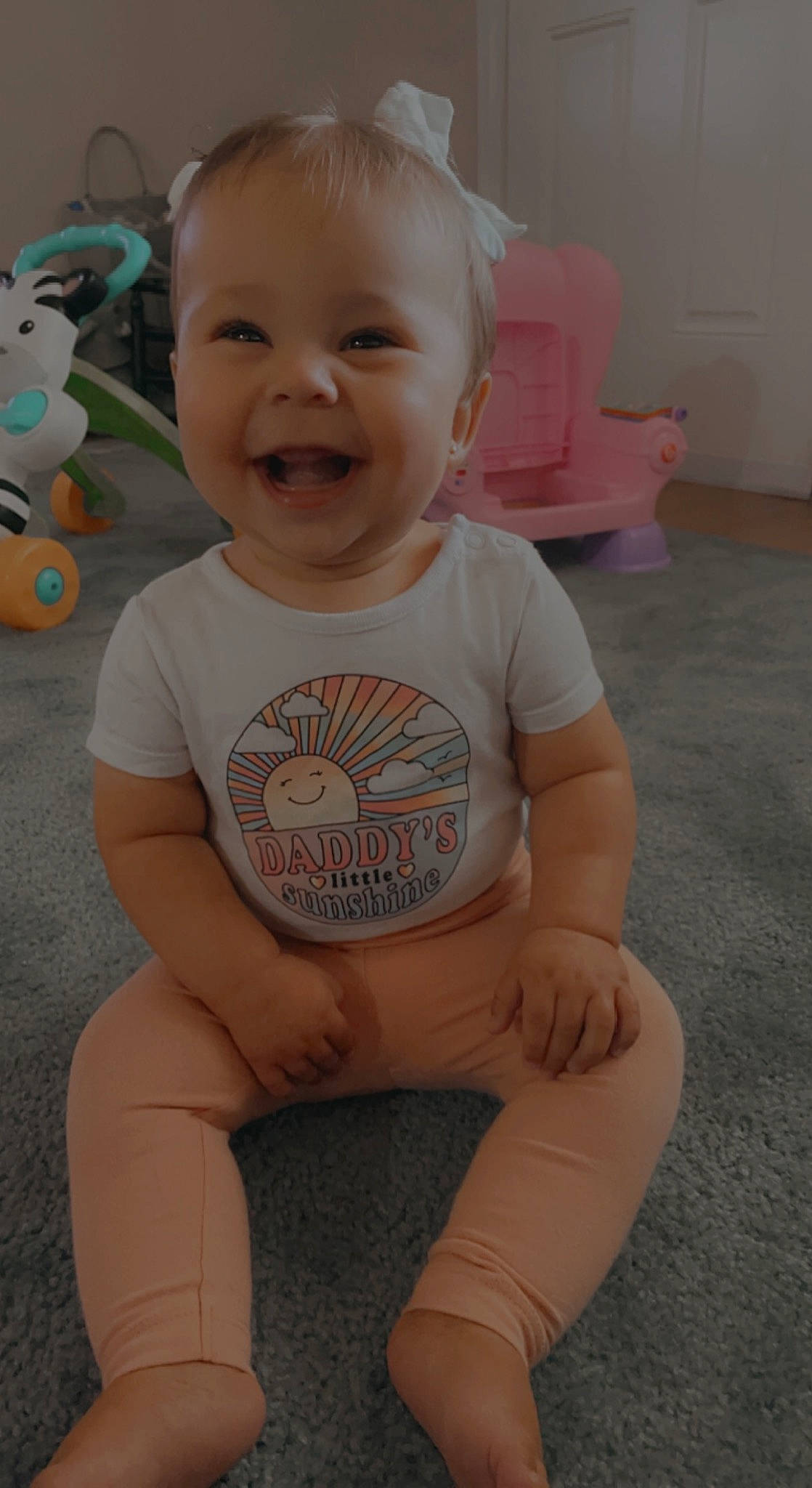 Charlotte is registered to the contest to win money with this photo: arm, baby_toddler_clothing, cheek, chin, eye, face, hair, hairstyle, head, human_body, joint, joy, leg, mouth, neck, nose, organ, person, photograph, skin