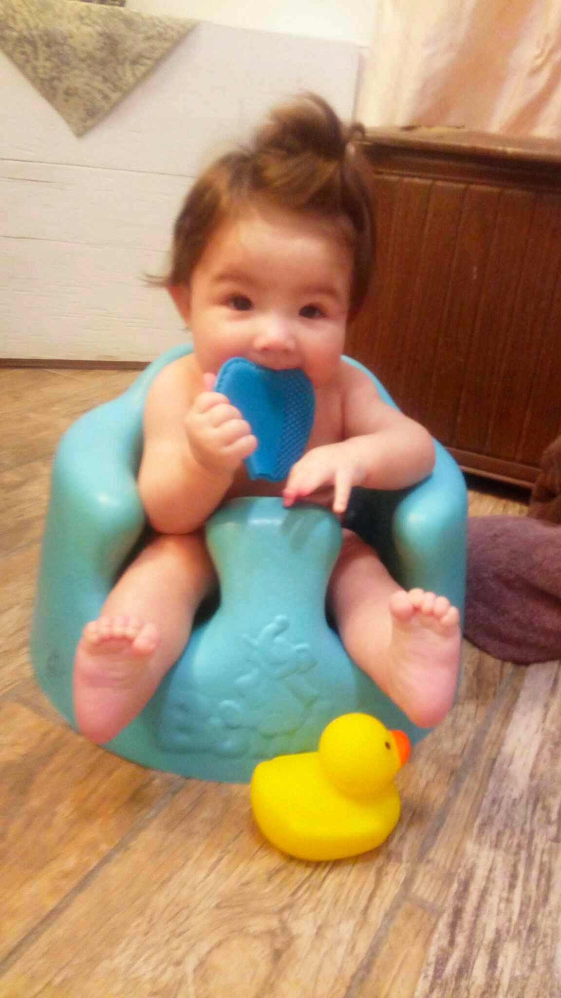 Serenity is registered to the contest to win money with this photo: baby, baby_products, baby_toddler_clothing, baby_toys, barefoot, bath_toy, bathing, chest, drinkware, foot, fun, nail, person, plastic, play, rubber_ducky, sitting, thigh, thumb, toddler