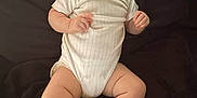 Natalie joined the competition — help win amazing prizes! baby, infant, child, onesie, socks, lying_down, curious, chubby, cute, soft_lighting, blanket, indoor, portrait, skin, hands, legs, feet, face, head, expression