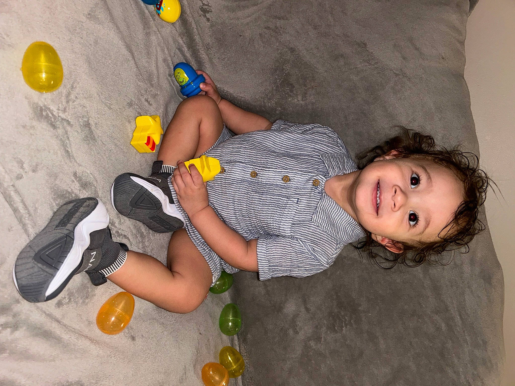 Jadiel is registered to the contest to win money with this photo: adventure, child, finger, flooring, foot, fun, happy, hat, human_leg, joint, joy, knee, leisure, person, plastic, play, recreation, sitting, smile, thigh