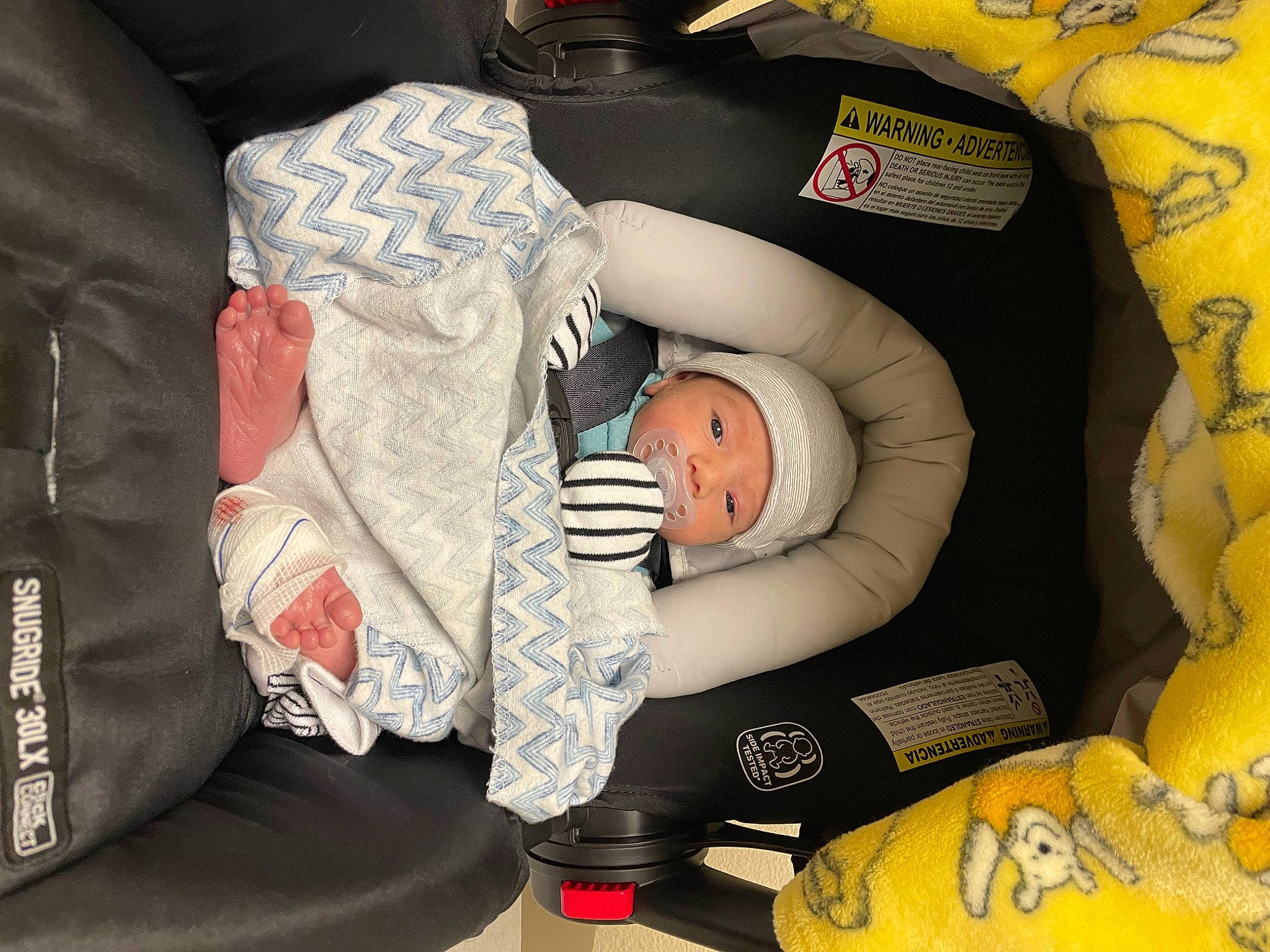 Andrés joined the competition — help win amazing prizes! baby, baby_carriage, baby_in_car_seat, baby_products, baby_safety, baby_sleeping, baby_toddler_clothing, car_seat, child, comfort, head, headwear, health_care, infant_bed, lap, mammal, orange, person, sleeve, textile