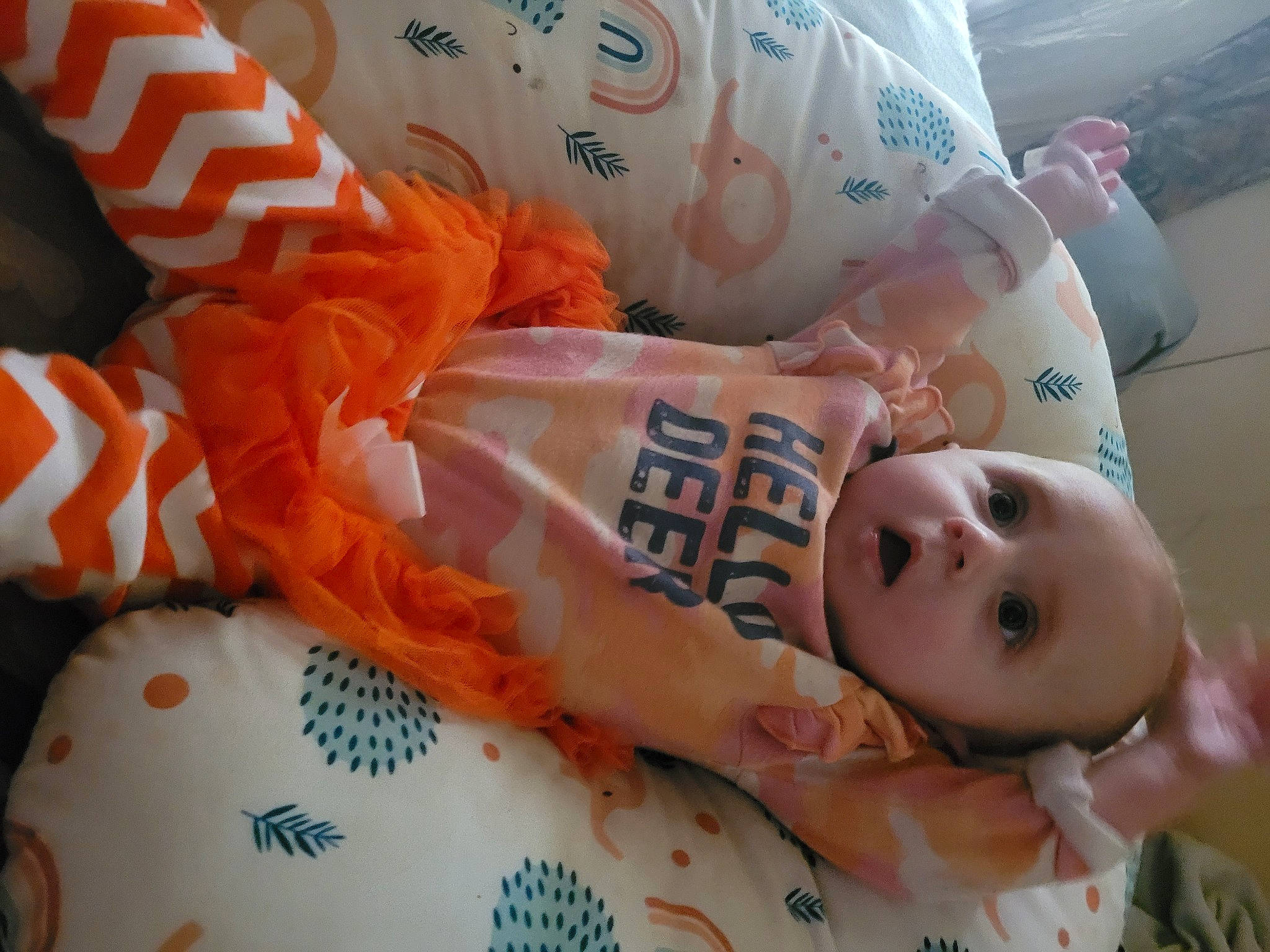 Kamilah joined the competition — help win amazing prizes! baby, baby_products, baby_toddler_clothing, child, comfort, happy, linens, peach, person, plastic, room, sleeve, smile, surprise, textile, toddler