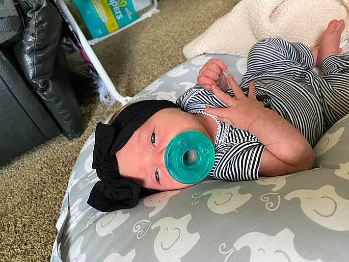 Kaelanii joined the competition — help win amazing prizes! baby, baby_products, baby_toddler_clothing, child, comfort, fashion_accessory, flooring, green, headwear, human_body, human_leg, joint, knee, linens, nail, pattern, person, sitting, thigh, toddler