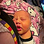 baby, blanket, closeup, clothing, colorful, couch, cute, face, hello_kitty, indoor, infant, newborn, pattern, peaceful, person, pink, resting, sleeping, snuggling, television