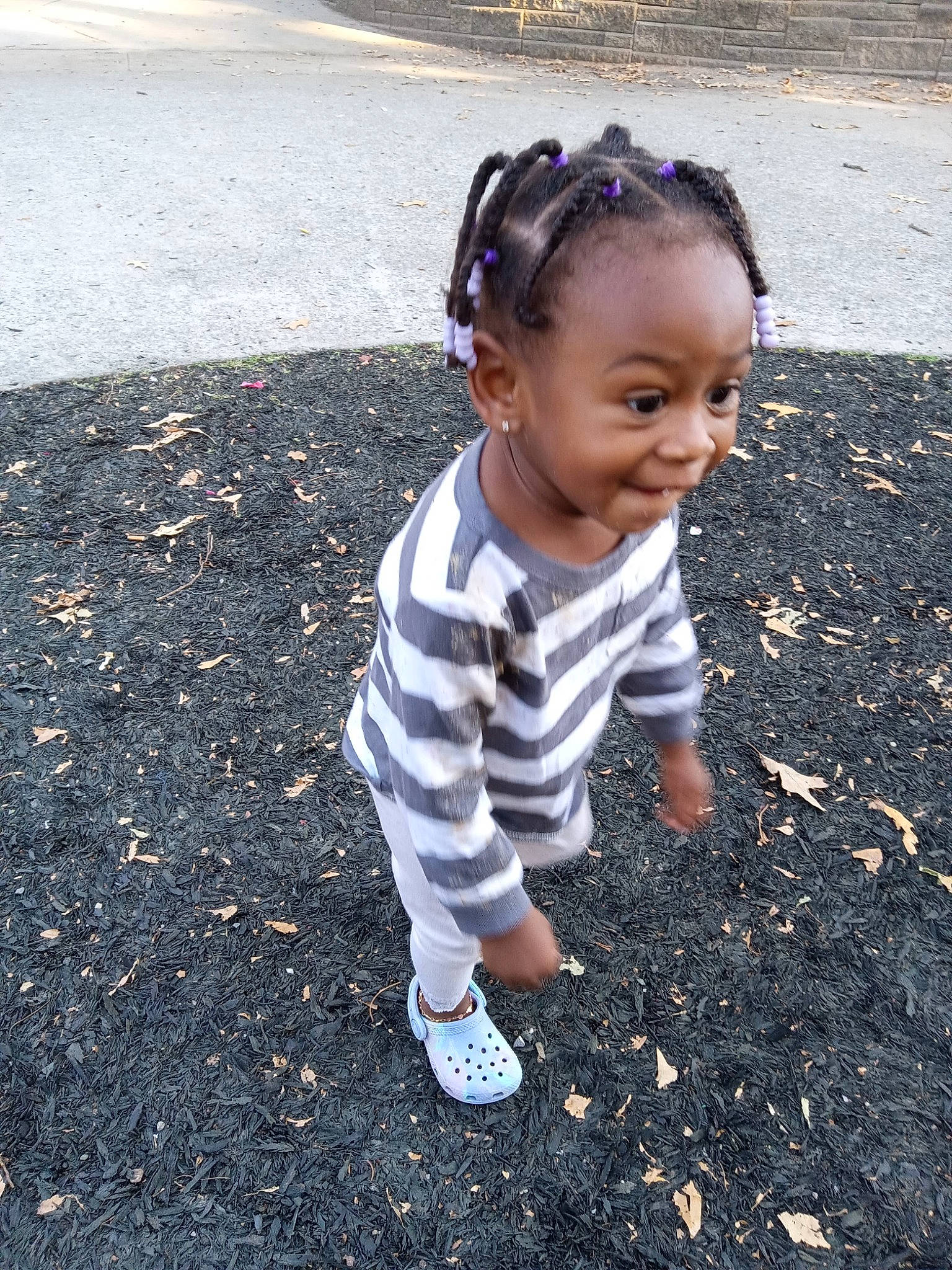 Brooklyn joined the competition — help win amazing prizes! asphalt, audio_equipment, baby, baby_toddler_clothing, child, face, fun, grass, happy, people_in_nature, person, portrait_photography, road_surface, shadow, sitting, smile, soil, toddler