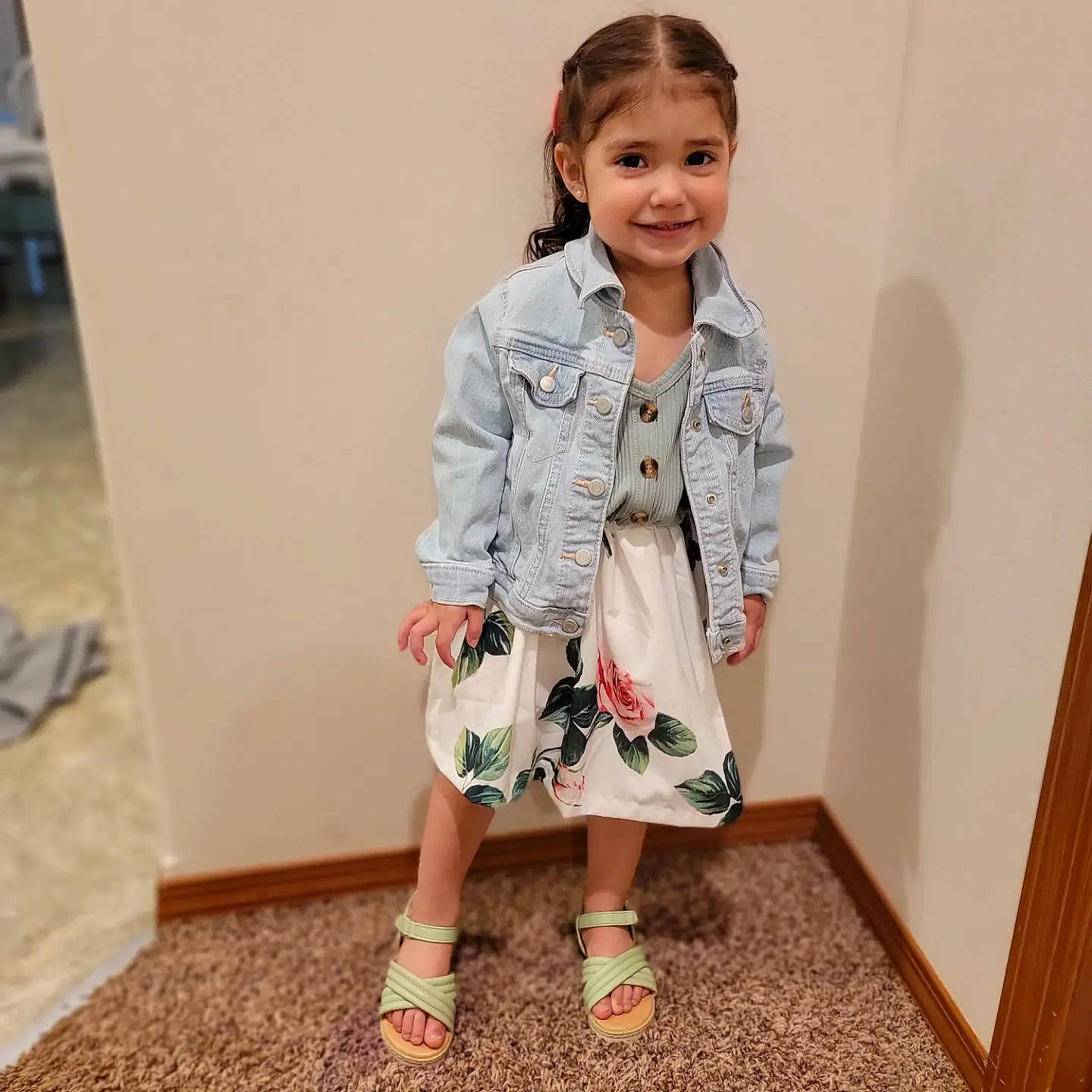 Elena is registered to the contest to win money with this photo: baby_toddler_clothing, blazer, collar, day_dress, dress_shirt, face, fashion_design, flooring, formal_wear, happy, human_leg, joy, knee, neck, pattern, person, sleeve, smile, t_shirt, thigh