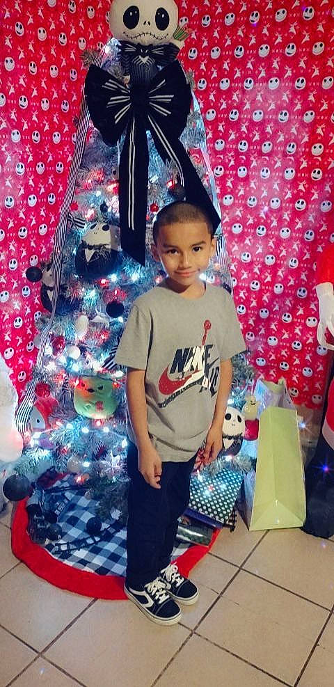 Jesus joined the competition — help win amazing prizes! blue, christmas, christmas_decoration, christmas_eve, christmas_ornament, christmas_tree, event, fun, happy, holiday, holiday_ornament, joy, ornament, pattern, people, person, red, sleeve, standing, textile