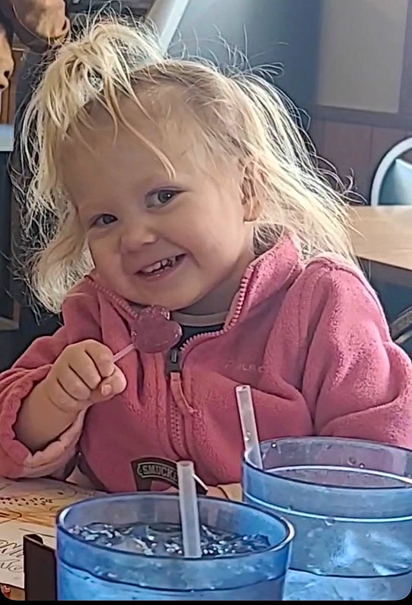 Kenzi is registered to the contest to win money with this photo: art, blond, cheek, child, drink, drinkware, electric_blue, finger, fun, glass, happy, iris, joy, organ, paint, person, play, product, smile, sweetness