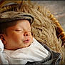 Jonathan is registered to the contest to win money with this photo: baby, newborn, sleeping, basket, blanket, hat, cozy, fur, portrait, infant, peaceful, soft_light, closed_eyes, cute, cradle, bedding, knit, headwear, rosy_cheeks, sleepy