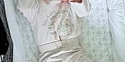 Noah is registered to the contest to win money with this photo: newborn, baby, sleeping, pacifier, crib, soft_clothing, peter_rabbit, plush_toy, blanket, infant, cute, child, bed, toddler, indoors, peaceful, resting, person, comfort, soft_toys