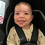 Brian joined the competition — help win amazing prizes! baby, child, smiling, tongue_out, car_seat, safety_harness, clothing, lightning_pattern, cute, infant, seatbelt, portrait, indoors, face, happy, young_child, seat, straps, closeup, person