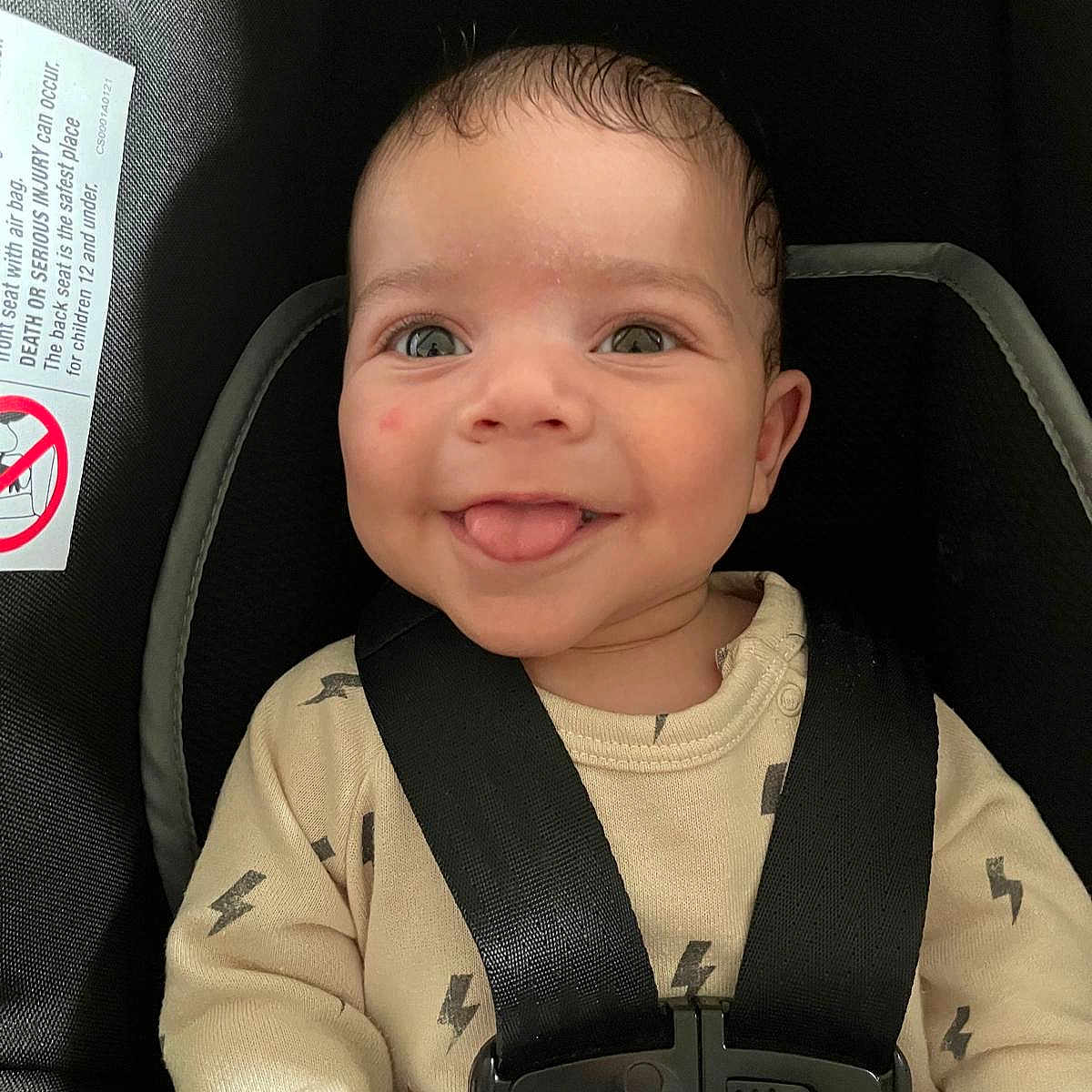 Brian joined the competition — help win amazing prizes! baby, car_seat, child, closeup, clothing, cute, face, happy, indoors, infant, lightning_pattern, person, portrait, safety_harness, seat, seatbelt, smiling, straps, tongue_out, young_child