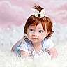 baby, child, portrait, red_hair, bow, hair_accessory, blue_eyes, smiling, indoor, fluffy_blanket, white_background, pastel_background, sitting, lying_down, overalls, white_shirt, infant, face, photography, cute
