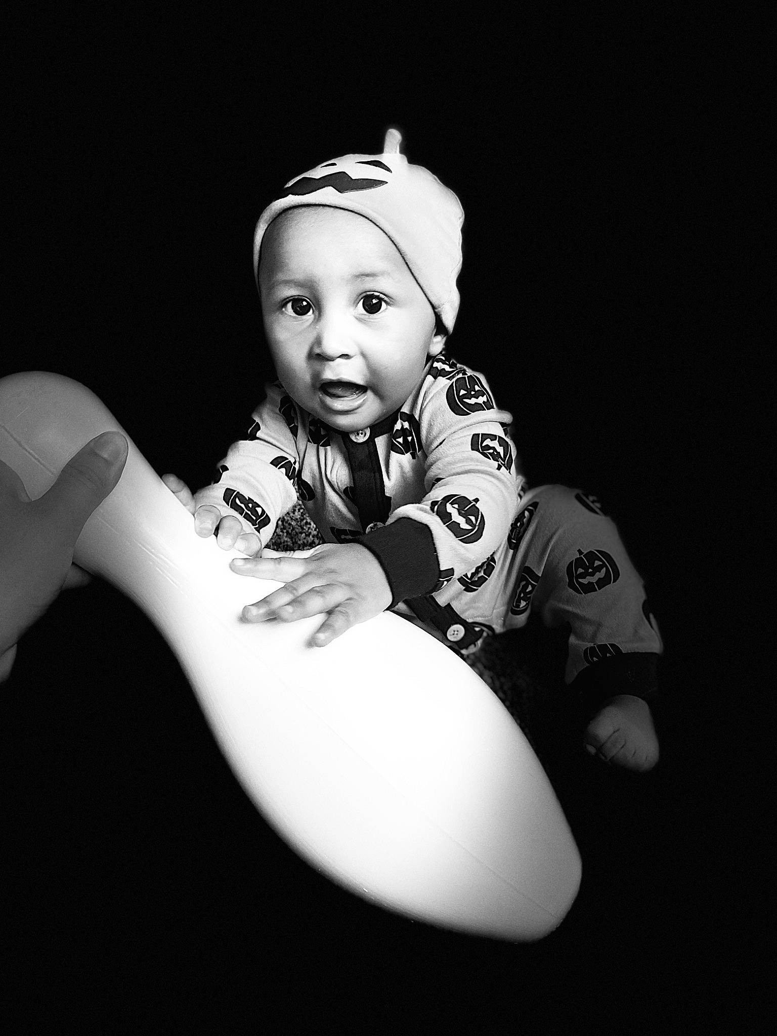 Damarious joined the competition — help win amazing prizes! baby, baby_toddler_clothing, child, darkness, elbow, entertainment, fashion_accessory, flash_photography, fun, gesture, happy, human_leg, jewellery, monochrome, monochrome_photography, person, room, sitting, still_life_photography, style