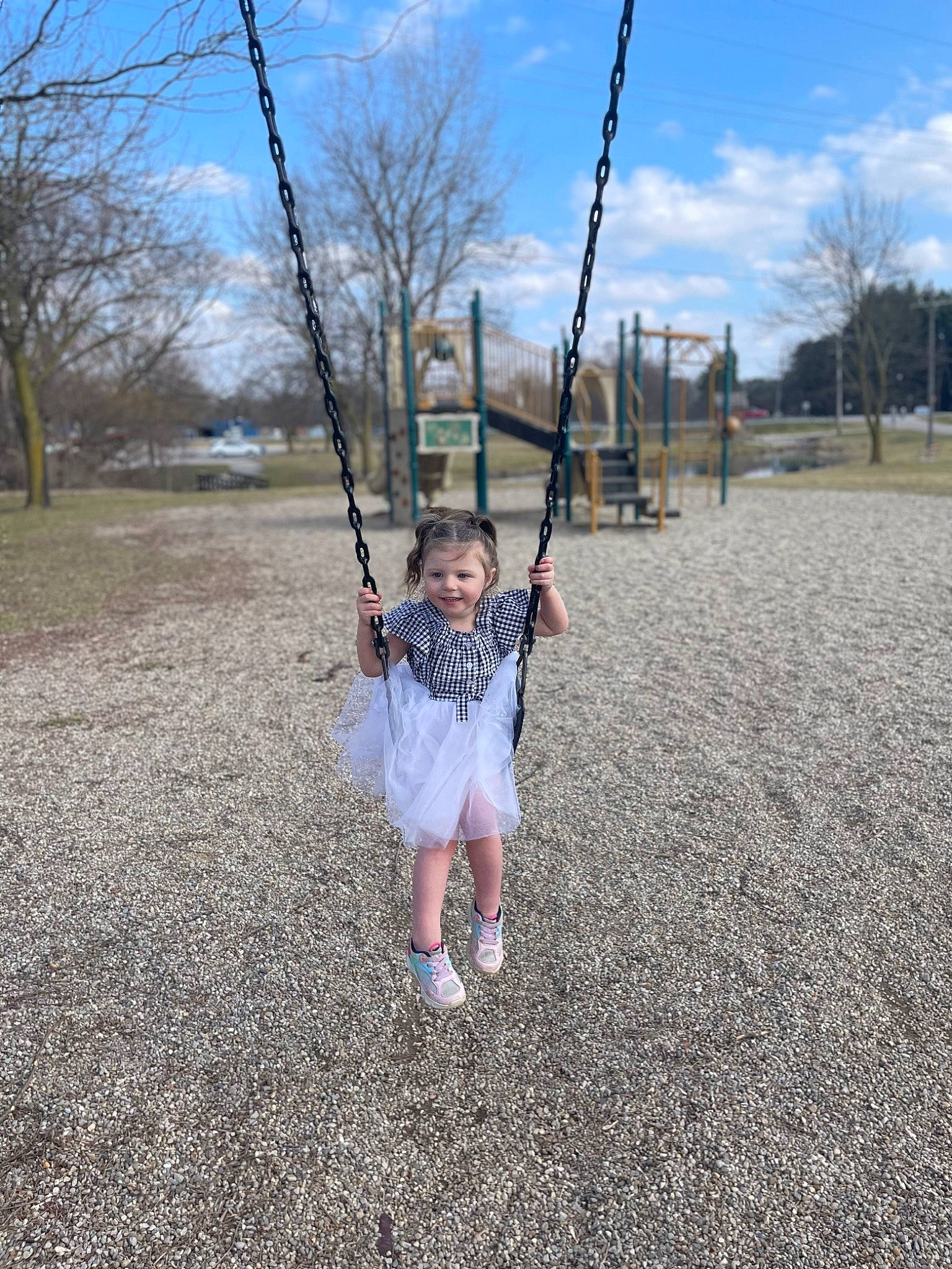 Hazel joined the competition — help win amazing prizes! baby, branch, city, cloud, fun, grass, grassland, happy, joy, leisure, outdoor_play_equipment, person, plant, playground, recreation, sky, soil, swing, toddler, tree