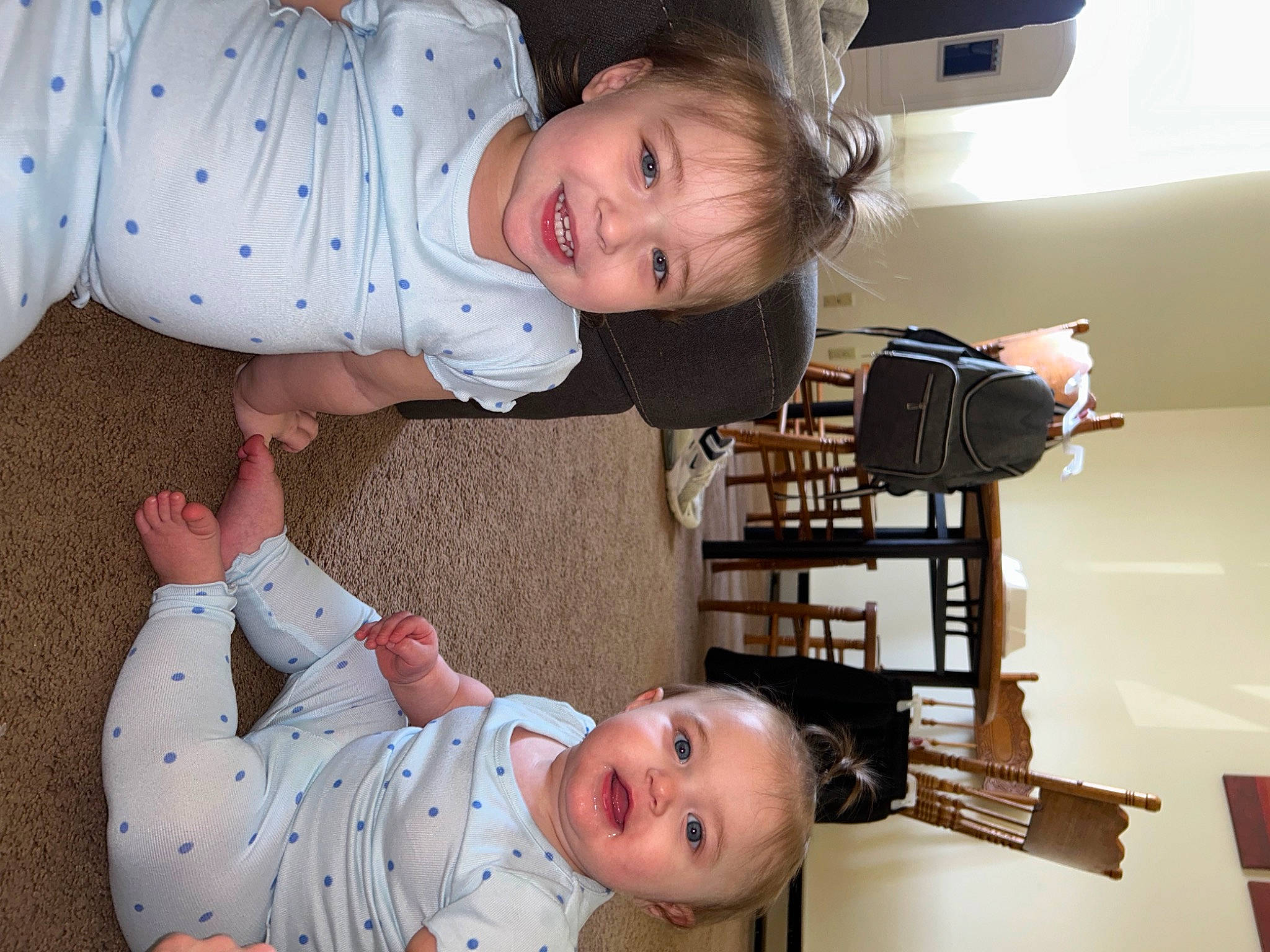 Amelia is registered to the contest to win money with this photo: arm, baby, baby_toddler_clothing, clothing, eye, face, facial_expression, finger, hairstyle, hand, head, joy, mammal, organ, person, photograph, product, skin, sleeve, smile