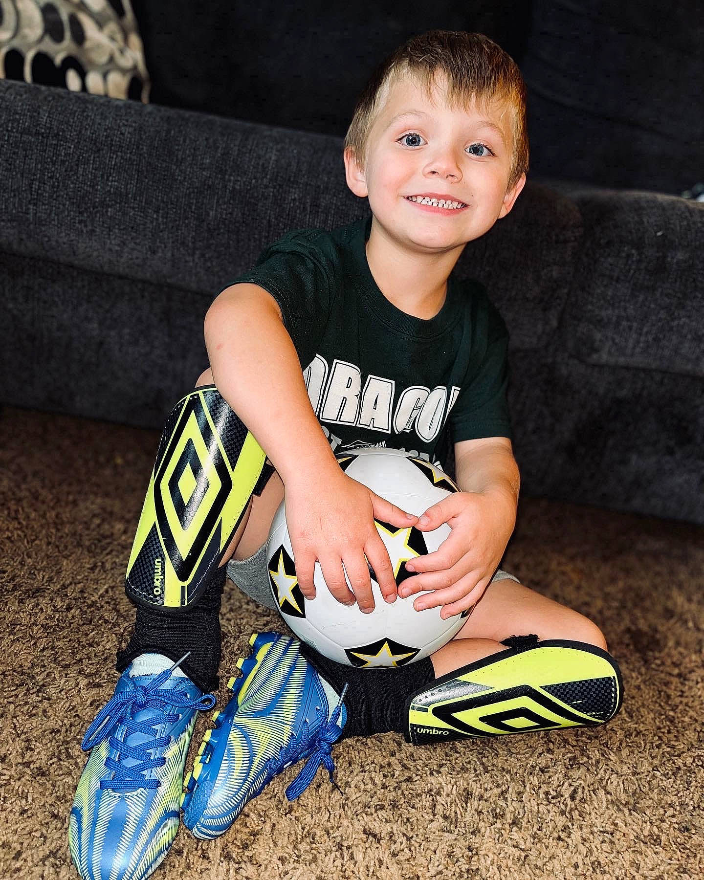 Malik joined the competition — help win amazing prizes! cleat, cool, elbow, flash_photography, footwear, grass, happy, human_leg, joy, knee, outdoor_shoe, person, shoe, shorts, sleeve, smile, sneakers, sportswear, t_shirt, thigh