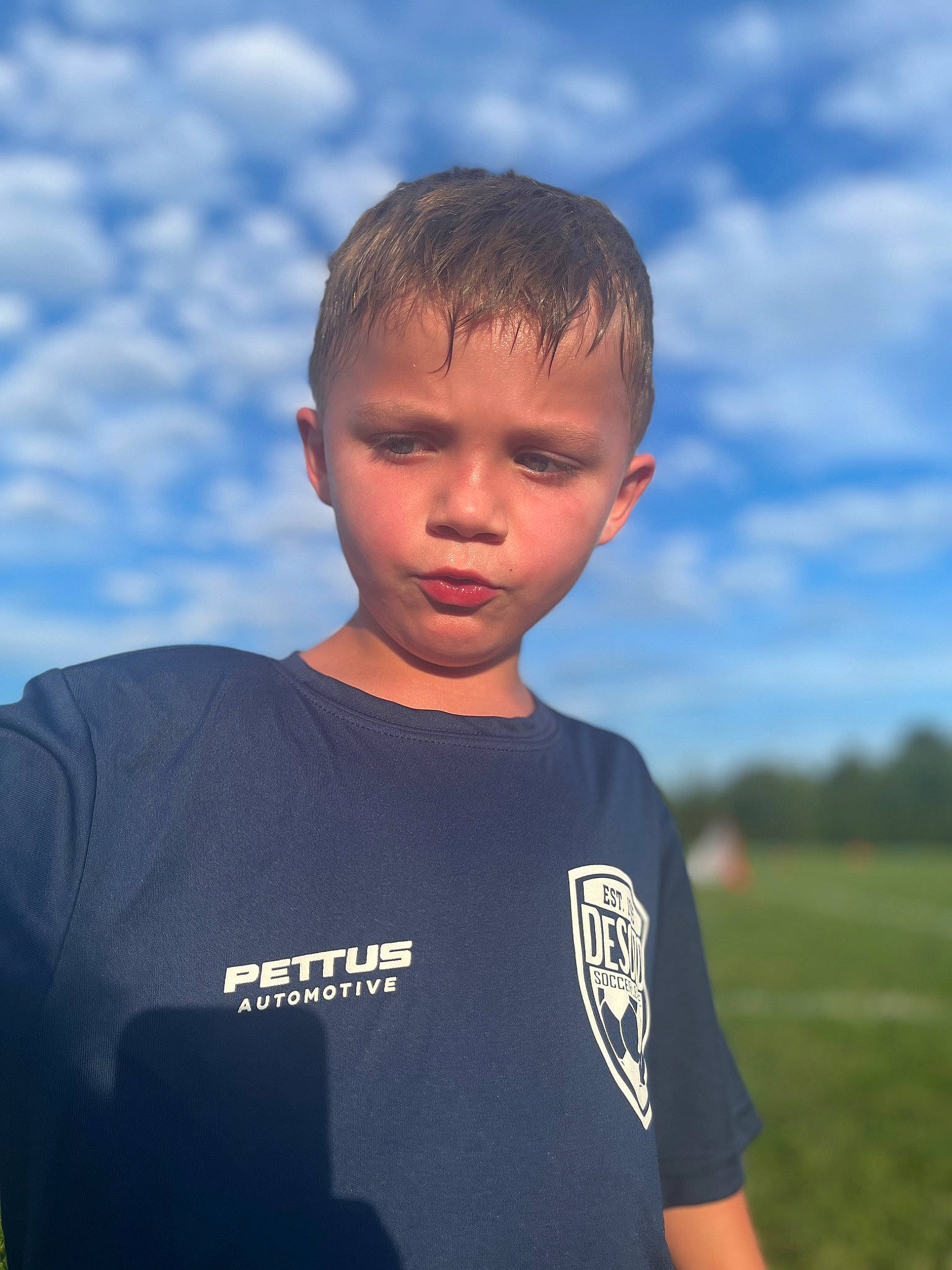 Malik joined the competition — help win amazing prizes! active_shirt, child, cloud, electric_blue, face, flash_photography, forehead, fun, grass, grassland, happy, landscape, person, portrait_photography, sky, sleeve, t_shirt, toddler, top, travel