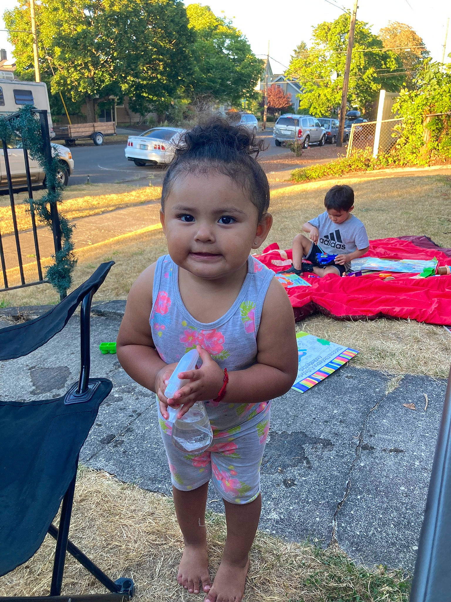 Olivia joined the competition — help win amazing prizes! asphalt, baby_toddler_clothing, car, child, fun, grass, happy, leisure, morning, person, plant, public_space, recreation, shorts, sky, summer, tire, toddler, tree, wheel