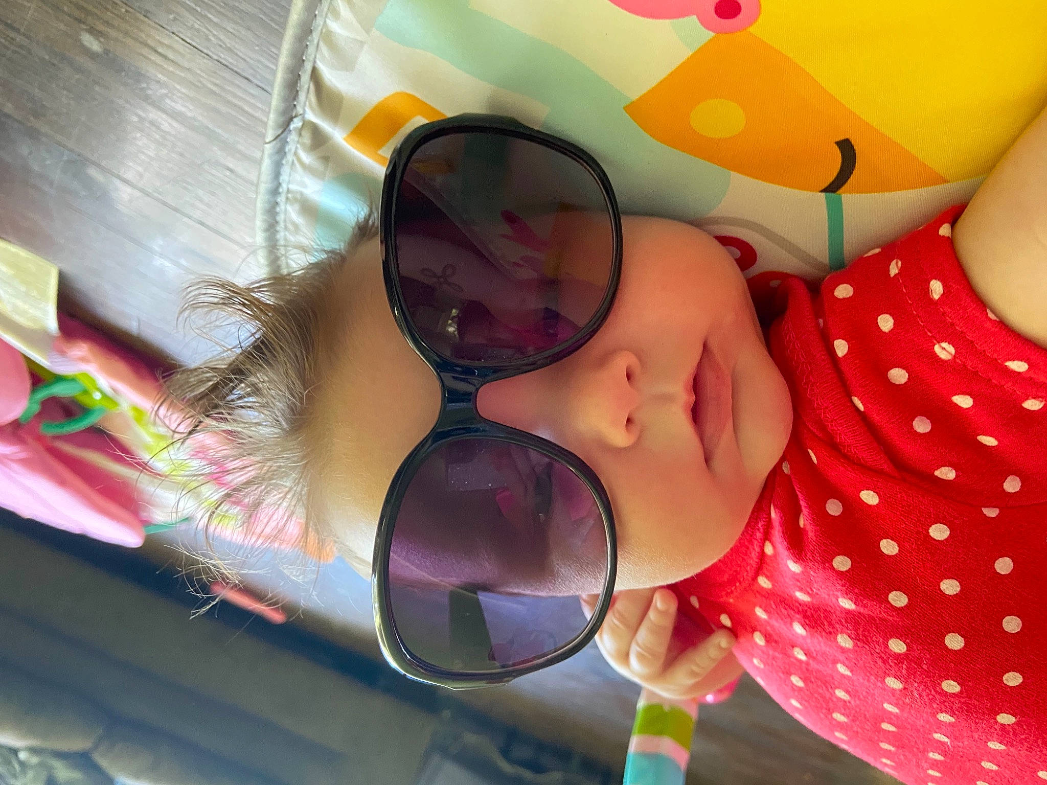 Lorelei is registered to the contest to win money with this photo: child, eye_glass_accessory, eyelash, eyewear, facial_expression, fun, goggles, happy, leisure, magenta, mouth, nail, pattern, person, personal_protective_equipment, pink, sunglasses, thigh, toddler, vision_care
