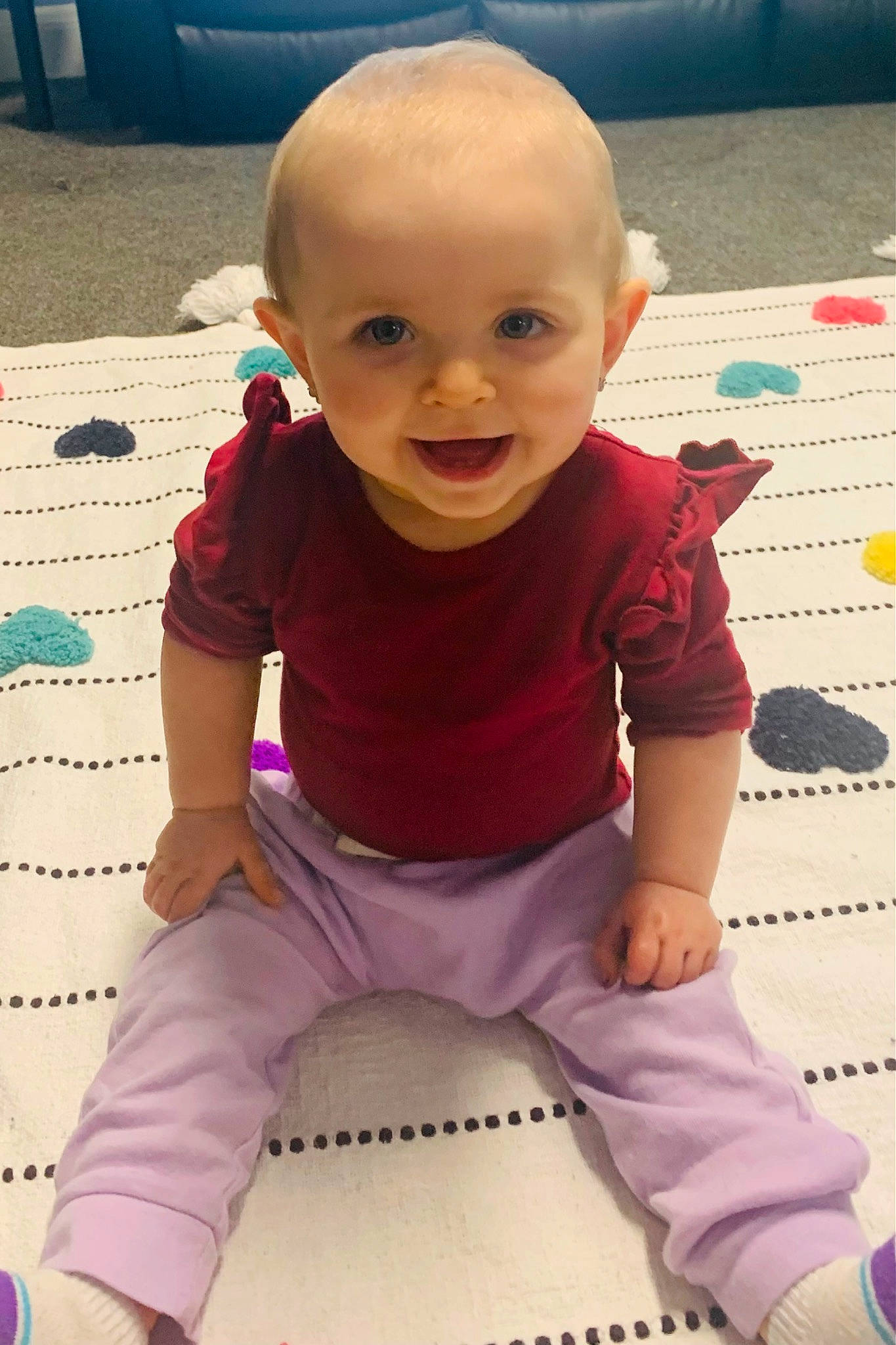 Trinity joined the competition — help win amazing prizes! arm, baby, baby_toddler_clothing, cheek, clothing, cool, facial_expression, finger, floor, flooring, hairstyle, happy, human, joint, person, pink, purple, skin, sleeve, smile
