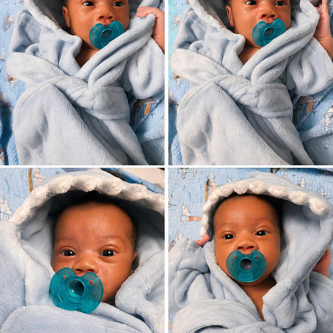 Noah is registered to the contest to win money with this photo: baby, infant, pacifier, blue_blanket, hooded_blanket, closeup, portrait, child, cute, soft_texture, wrapped, indoor, baby_face, newborn, sleepwear, comfort, cozy, baby_boy, blanket, toddler
